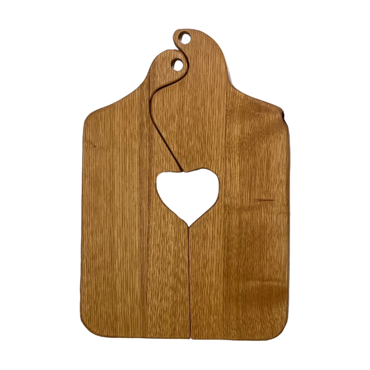 Coppia di taglieri in legno massello di castagno con foro a cuore centrale, artigianato italiano naturale