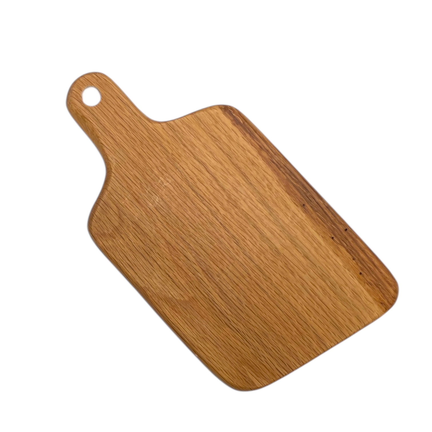 Tagliere artigianale in legno massello di quercia con manico, finitura naturale e venature eleganti